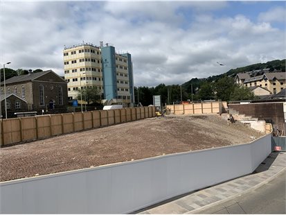 Fenced off land with Sardis House in background