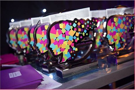 Trophies with colourful female face profile