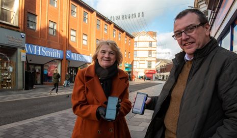 Cabinet Members Maureen Webber and Mark Norris using the Wi-Fi in Pontypridd