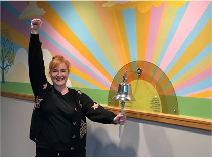 Laura Ringing the bell at Velindre Cancer Centre 1