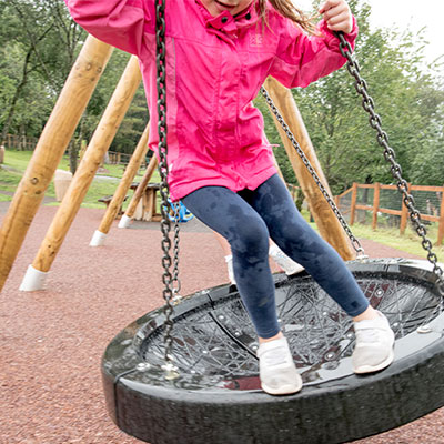 Girl-playing-in-park